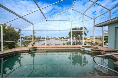 Welcome to your ultimate waterfront retreat in Punta Gorda Isles on Saint Andrews South Golf Club in Florida - for sale on GolfHomes.com, golf home, golf lot