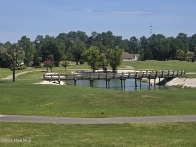 This charming farmhouse-style home with wraparound porches on Ocean Ridge Plantation in North Carolina - for sale on GolfHomes.com, golf home, golf lot