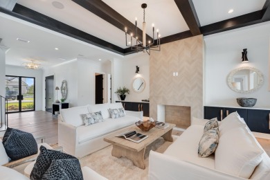 A stunning fusion of modern elegance and sophistication, nestled on Camp Creek Golf Course in Florida - for sale on GolfHomes.com, golf home, golf lot