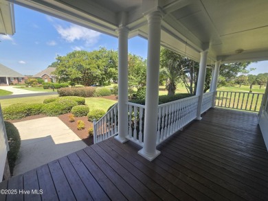 This charming farmhouse-style home with wraparound porches on Ocean Ridge Plantation in North Carolina - for sale on GolfHomes.com, golf home, golf lot
