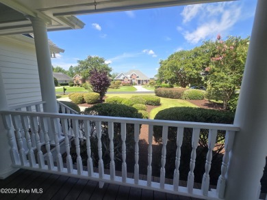 This charming farmhouse-style home with wraparound porches on Ocean Ridge Plantation in North Carolina - for sale on GolfHomes.com, golf home, golf lot