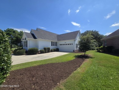 This charming farmhouse-style home with wraparound porches on Ocean Ridge Plantation in North Carolina - for sale on GolfHomes.com, golf home, golf lot