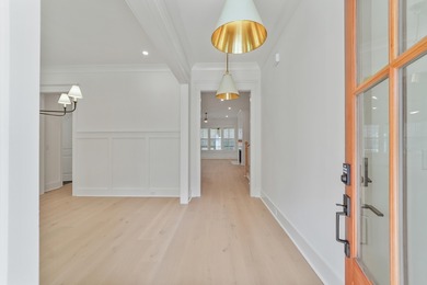 Welcome to this stunning 4 Bed / 3.5 Bath custom-built NEW on The Links at Stono Ferry in South Carolina - for sale on GolfHomes.com, golf home, golf lot