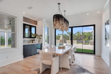 A stunning fusion of modern elegance and sophistication, nestled on Camp Creek Golf Course in Florida - for sale on GolfHomes.com, golf home, golf lot