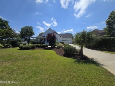 This charming farmhouse-style home with wraparound porches on Ocean Ridge Plantation in North Carolina - for sale on GolfHomes.com, golf home, golf lot