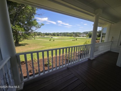 This charming farmhouse-style home with wraparound porches on Ocean Ridge Plantation in North Carolina - for sale on GolfHomes.com, golf home, golf lot