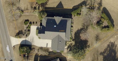 This charming farmhouse-style home with wraparound porches on Ocean Ridge Plantation in North Carolina - for sale on GolfHomes.com, golf home, golf lot