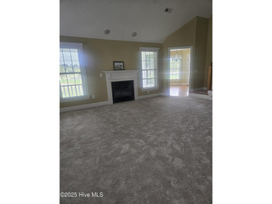 This charming farmhouse-style home with wraparound porches on Ocean Ridge Plantation in North Carolina - for sale on GolfHomes.com, golf home, golf lot