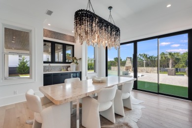 A stunning fusion of modern elegance and sophistication, nestled on Camp Creek Golf Course in Florida - for sale on GolfHomes.com, golf home, golf lot