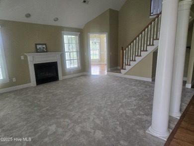 This charming farmhouse-style home with wraparound porches on Ocean Ridge Plantation in North Carolina - for sale on GolfHomes.com, golf home, golf lot