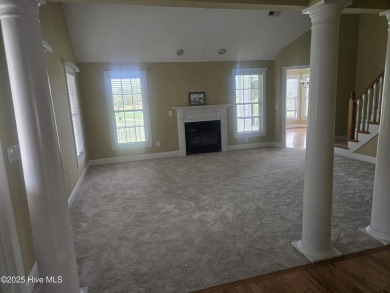 This charming farmhouse-style home with wraparound porches on Ocean Ridge Plantation in North Carolina - for sale on GolfHomes.com, golf home, golf lot