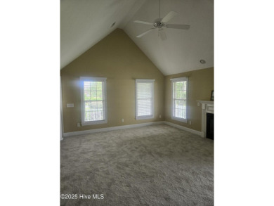 This charming farmhouse-style home with wraparound porches on Ocean Ridge Plantation in North Carolina - for sale on GolfHomes.com, golf home, golf lot