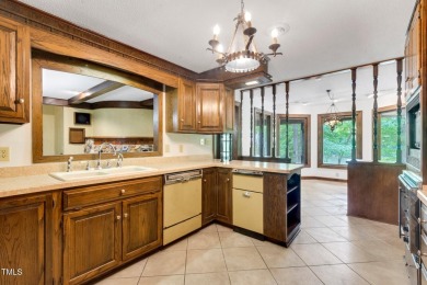 Exquisite single-family Tudor residence nestled in the charming on Keith Hills Country Club  in North Carolina - for sale on GolfHomes.com, golf home, golf lot