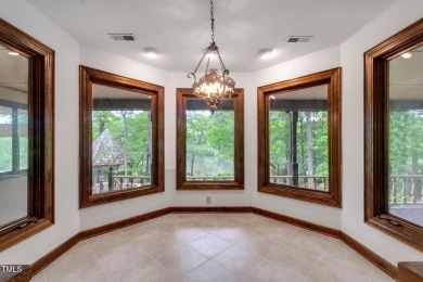 Exquisite single-family Tudor residence nestled in the charming on Keith Hills Country Club  in North Carolina - for sale on GolfHomes.com, golf home, golf lot