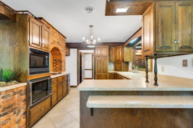 Exquisite single-family Tudor residence nestled in the charming on Keith Hills Country Club  in North Carolina - for sale on GolfHomes.com, golf home, golf lot