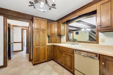 Exquisite single-family Tudor residence nestled in the charming on Keith Hills Country Club  in North Carolina - for sale on GolfHomes.com, golf home, golf lot