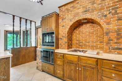 Exquisite single-family Tudor residence nestled in the charming on Keith Hills Country Club  in North Carolina - for sale on GolfHomes.com, golf home, golf lot