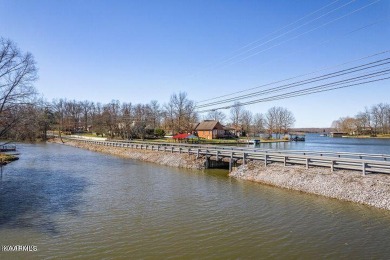 Lake Lot on Lake Tansi. Half acre wooded lot. Lake access to big on Lake Tansi Village Country Club in Tennessee - for sale on GolfHomes.com, golf home, golf lot