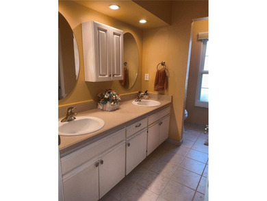 One or more photo(s) has been virtually staged. This villa at on Mainlands Golf Club in Florida - for sale on GolfHomes.com, golf home, golf lot