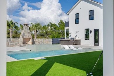 A stunning fusion of modern elegance and sophistication, nestled on Camp Creek Golf Course in Florida - for sale on GolfHomes.com, golf home, golf lot