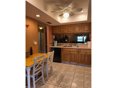 One or more photo(s) has been virtually staged. This villa at on Mainlands Golf Club in Florida - for sale on GolfHomes.com, golf home, golf lot