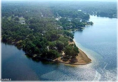 Lake Lot on Lake Tansi. Half acre wooded lot. Lake access to big on Lake Tansi Village Country Club in Tennessee - for sale on GolfHomes.com, golf home, golf lot