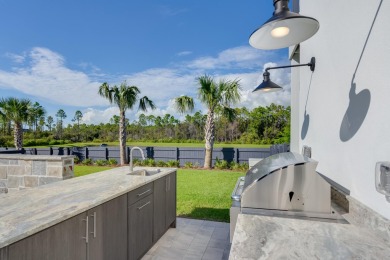 A stunning fusion of modern elegance and sophistication, nestled on Camp Creek Golf Course in Florida - for sale on GolfHomes.com, golf home, golf lot