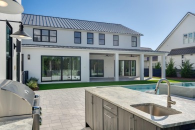 A stunning fusion of modern elegance and sophistication, nestled on Camp Creek Golf Course in Florida - for sale on GolfHomes.com, golf home, golf lot