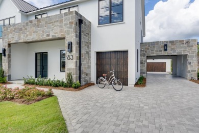 A stunning fusion of modern elegance and sophistication, nestled on Camp Creek Golf Course in Florida - for sale on GolfHomes.com, golf home, golf lot