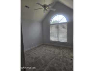 This charming farmhouse-style home with wraparound porches on Ocean Ridge Plantation in North Carolina - for sale on GolfHomes.com, golf home, golf lot