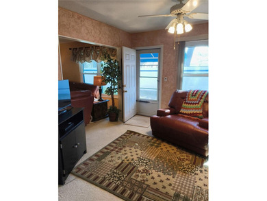 One or more photo(s) has been virtually staged. This villa at on Mainlands Golf Club in Florida - for sale on GolfHomes.com, golf home, golf lot