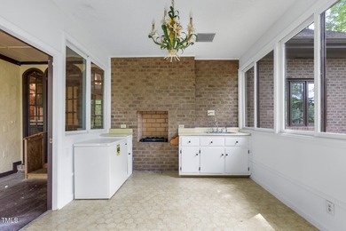 Exquisite single-family Tudor residence nestled in the charming on Keith Hills Country Club  in North Carolina - for sale on GolfHomes.com, golf home, golf lot