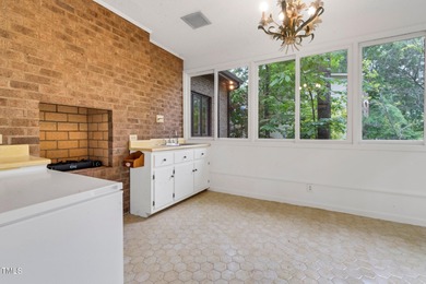 Exquisite single-family Tudor residence nestled in the charming on Keith Hills Country Club  in North Carolina - for sale on GolfHomes.com, golf home, golf lot