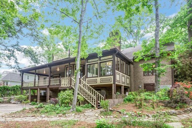 Exquisite single-family Tudor residence nestled in the charming on Keith Hills Country Club  in North Carolina - for sale on GolfHomes.com, golf home, golf lot
