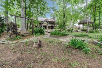 Exquisite single-family Tudor residence nestled in the charming on Keith Hills Country Club  in North Carolina - for sale on GolfHomes.com, golf home, golf lot
