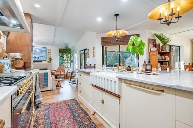 Welcome to this truly one-of-a-kind residence in Eagle Ridge on Eagle Ridge Golf and Tennis Club in Florida - for sale on GolfHomes.com, golf home, golf lot