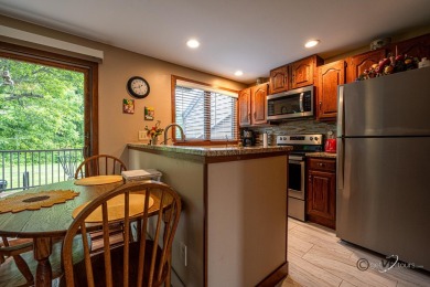 Enjoy added peace and quiet in this desirable end-unit location on Eagle Ridge Inn and Resort in Illinois - for sale on GolfHomes.com, golf home, golf lot