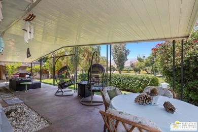 With a private setting on an elevated street in Cathedral City's on Date Palm Country Club in California - for sale on GolfHomes.com, golf home, golf lot