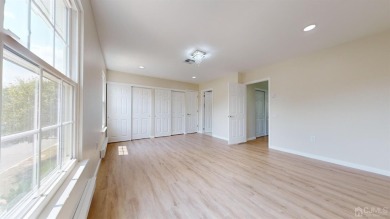 Stunning, fully remodeled end unit in desirable Clearbrook on Clearbrook Golf Club in New Jersey - for sale on GolfHomes.com, golf home, golf lot