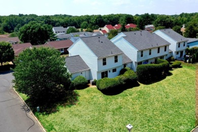 Stunning, fully remodeled end unit in desirable Clearbrook on Clearbrook Golf Club in New Jersey - for sale on GolfHomes.com, golf home, golf lot