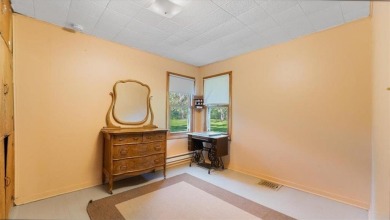 Offered for sale for the first time, this 1941 home is located on St. Cloud Country Club in Minnesota - for sale on GolfHomes.com, golf home, golf lot
