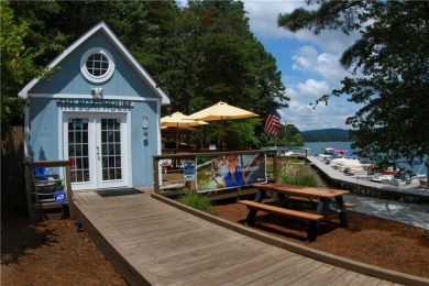 Beautiful Craftsman RANCH with a THREE-car garage. A rare on The Highlands Course at Lake Arrowhead in Georgia - for sale on GolfHomes.com, golf home, golf lot