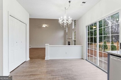 Lovely home in a prime Johns Creek location, tucked in an active on The Standard Club in Georgia - for sale on GolfHomes.com, golf home, golf lot