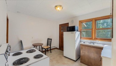Offered for sale for the first time, this 1941 home is located on St. Cloud Country Club in Minnesota - for sale on GolfHomes.com, golf home, golf lot