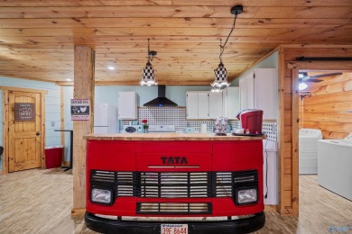 Discover this incredible property that combines the comfort of a on Scottsboro Golf and Country Club in Alabama - for sale on GolfHomes.com, golf home, golf lot