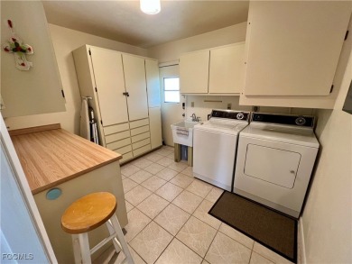 Spacious 1,700 sq ft condo in the quiet community of East Greens on Lehigh Resort Club in Florida - for sale on GolfHomes.com, golf home, golf lot