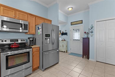 PRIVACY, BEAUTY, GORGEOUS SUNSETS & EASY LIVING in this Upgraded on The Links of Spruce Creek in Florida - for sale on GolfHomes.com, golf home, golf lot