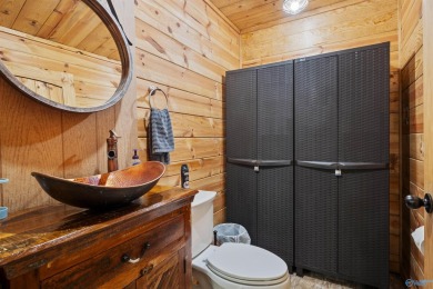 Discover this incredible property that combines the comfort of a on Scottsboro Golf and Country Club in Alabama - for sale on GolfHomes.com, golf home, golf lot