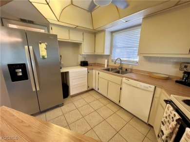 Spacious 1,700 sq ft condo in the quiet community of East Greens on Lehigh Resort Club in Florida - for sale on GolfHomes.com, golf home, golf lot