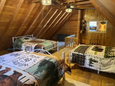 You really need to come see this adorable rustic cabin in a on Bijou Golf Course in California - for sale on GolfHomes.com, golf home, golf lot